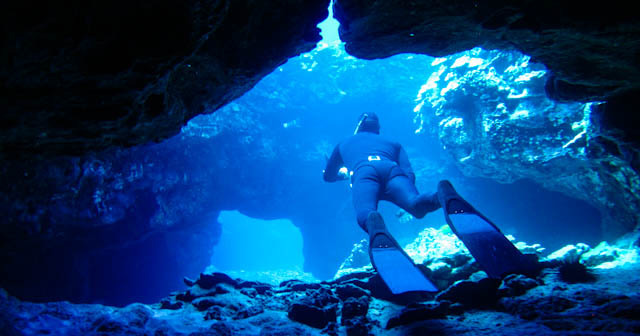 two divers under water